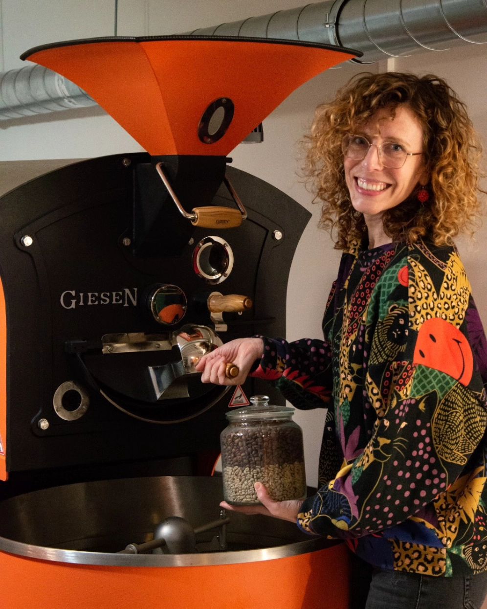 Portrait of Carlina Rinaldi Johnson of Corde Coffee in her roastery